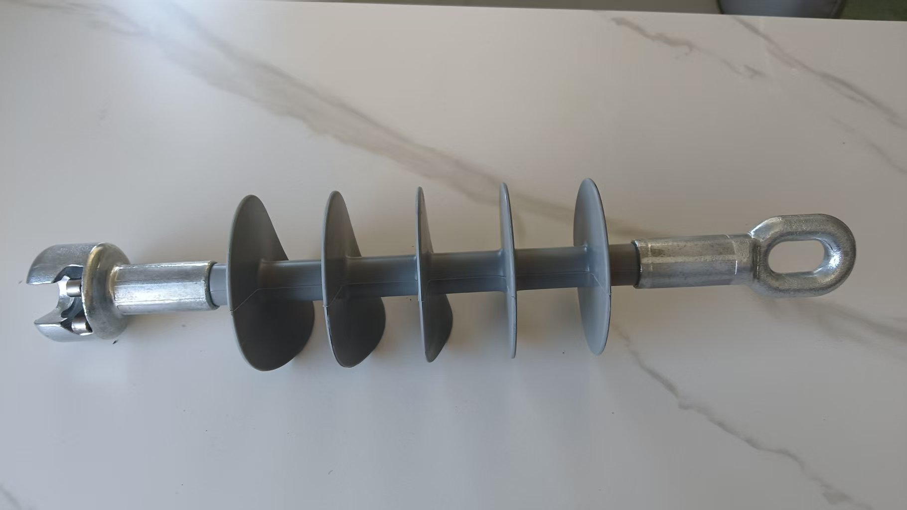 Composite suspension insulator and polymer tension insulator applications in transmission grids